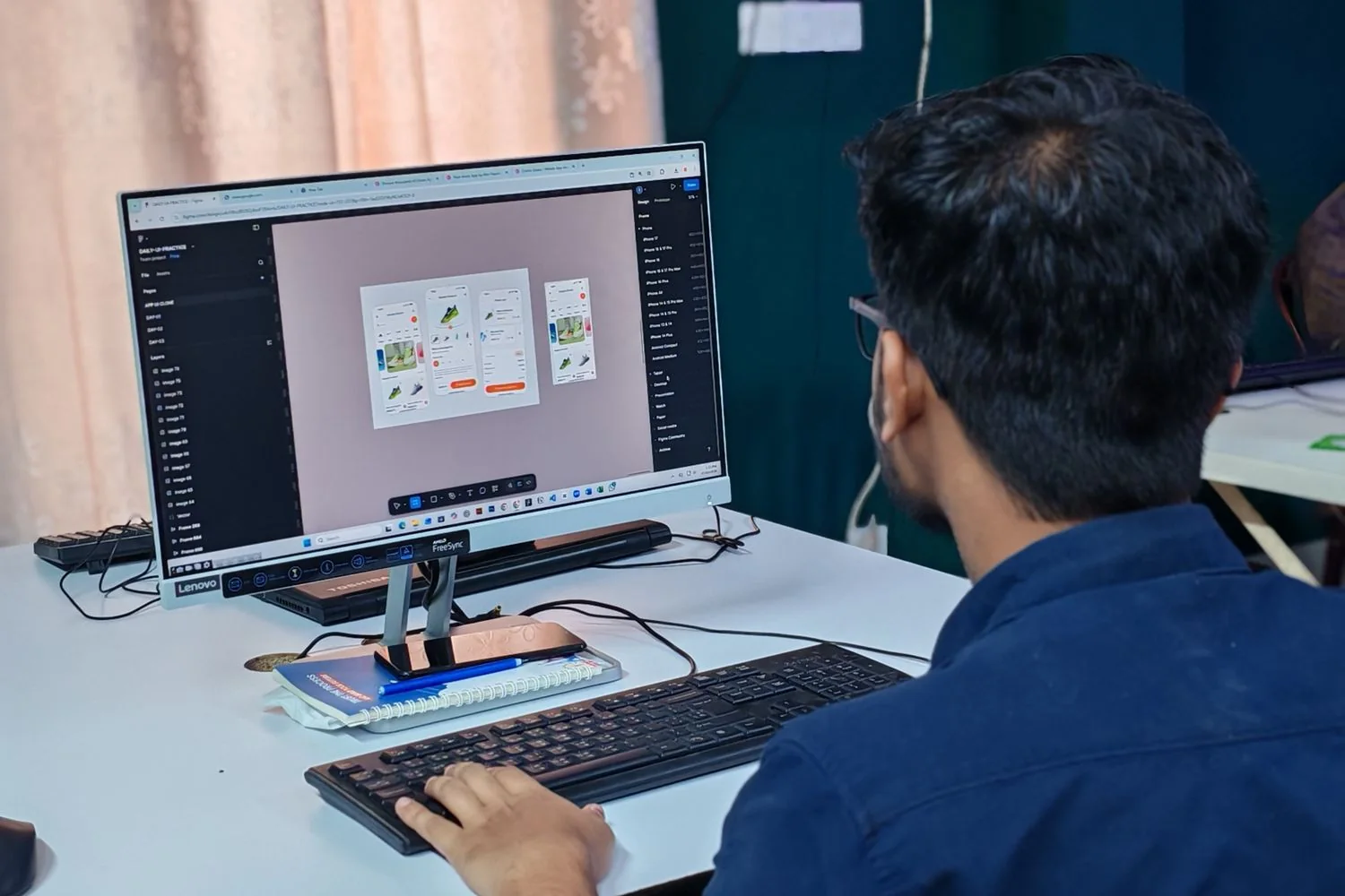 UI/UX designer working on interface concepts